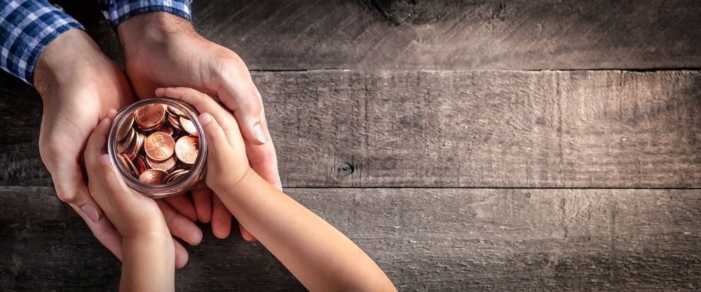 Father holding his child's hand