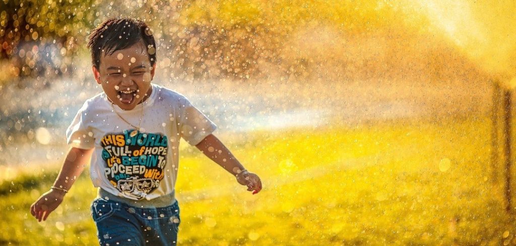 Child running in a park