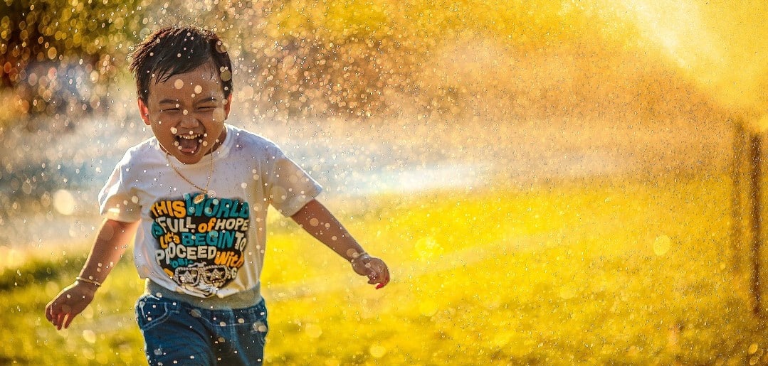 Child running in a park