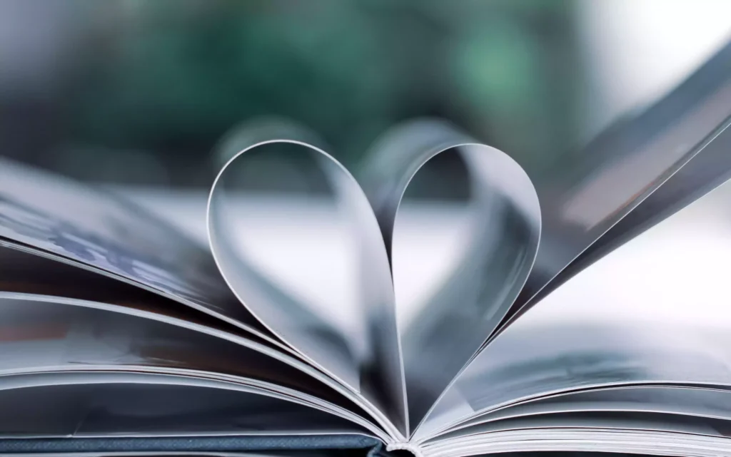 Center pages of book making heart shape