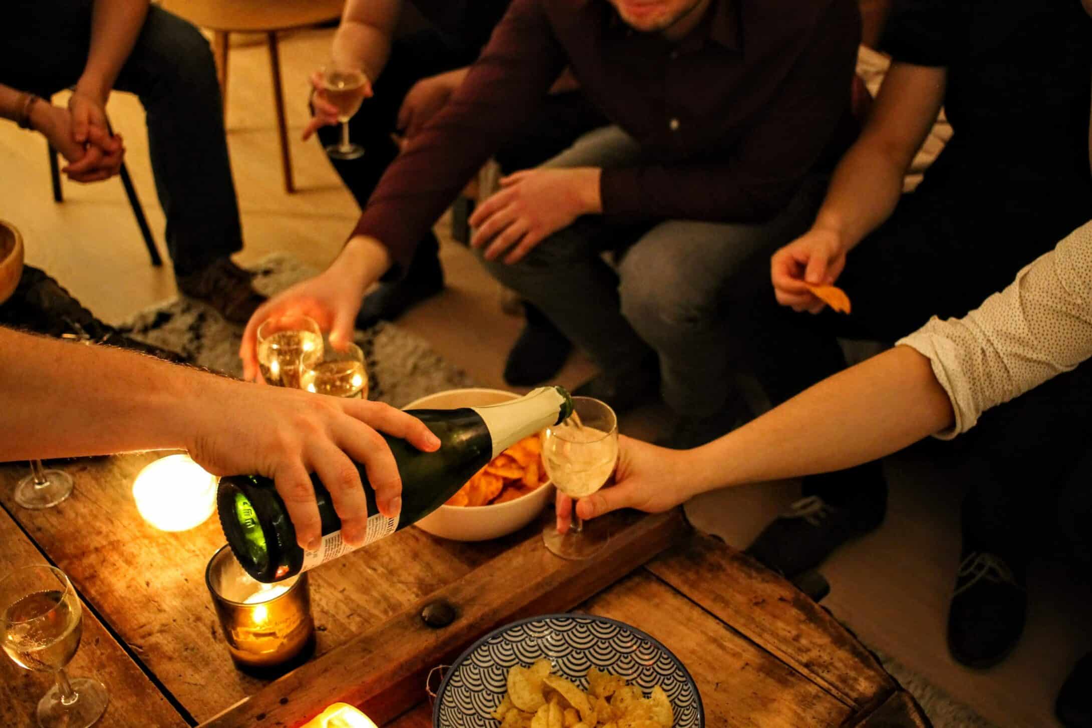 A group of friends having a get-together for discussing the divorce of one of them