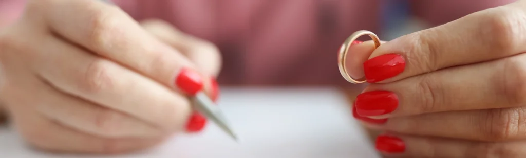 Woman holding wedding ring