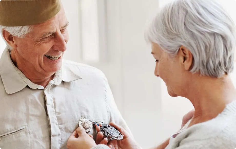 Old military couple celebrating a long happy marriage