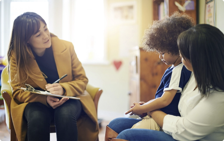 Psychologist in a therapy session with a kid