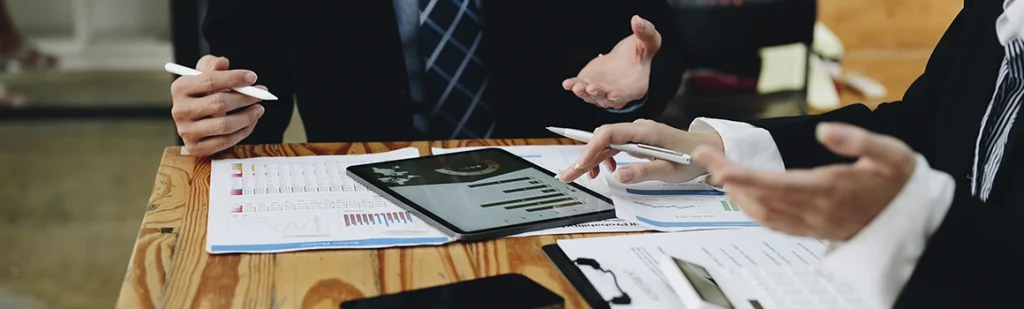 family lawyers and bankruptcy attorneys collaborating at desk