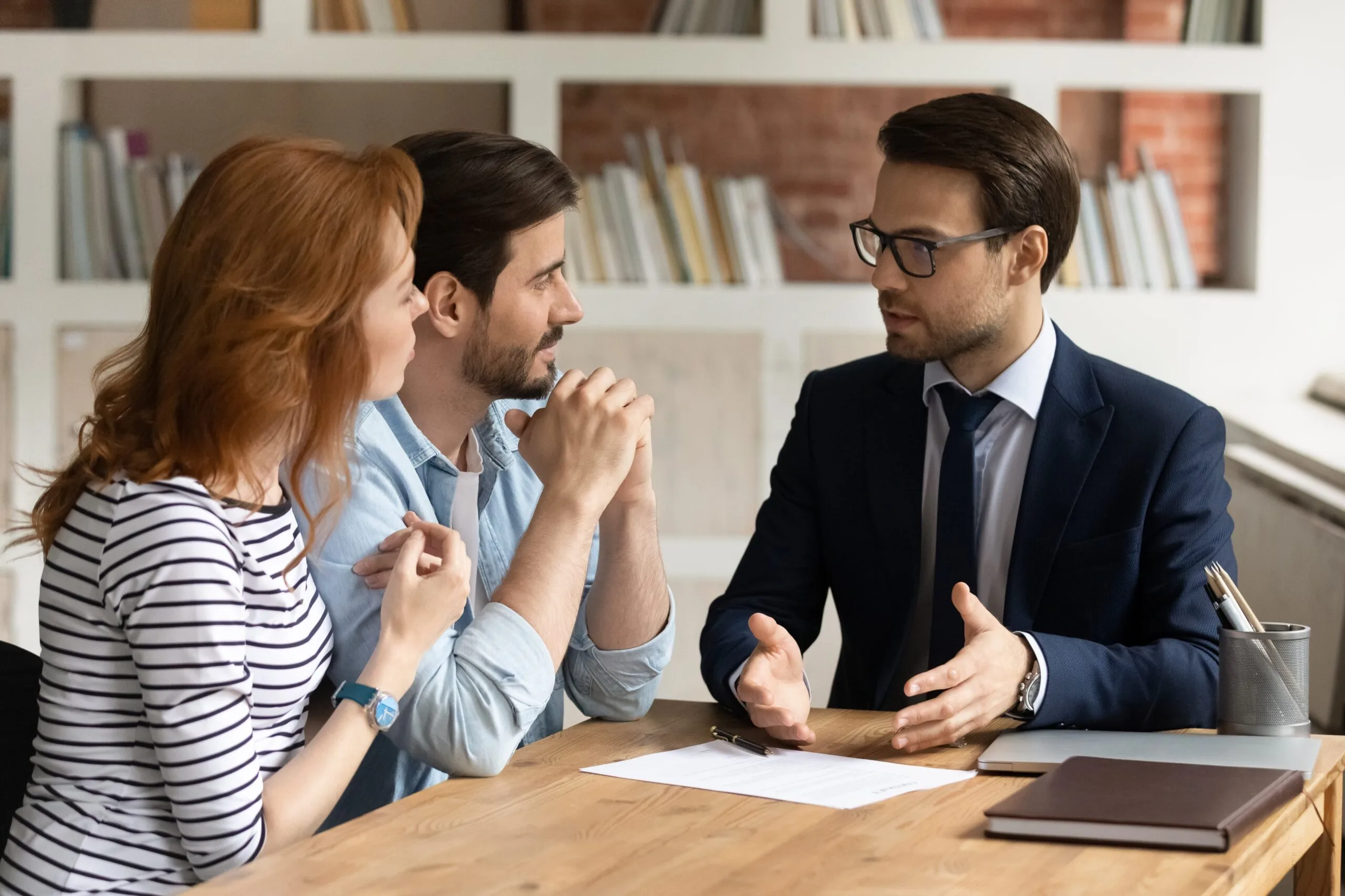 A Seattle family law attorney explaining Washington State community property laws to an engaged couple.
