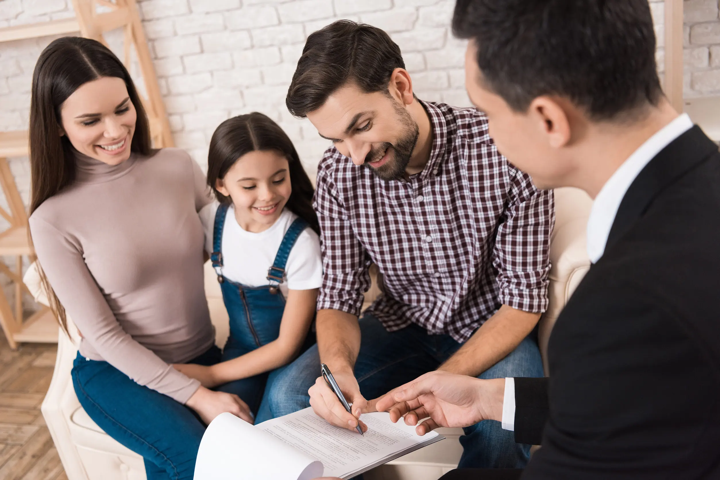 Adoptive parents meeting with a licensed adoption agency representative in Seattle