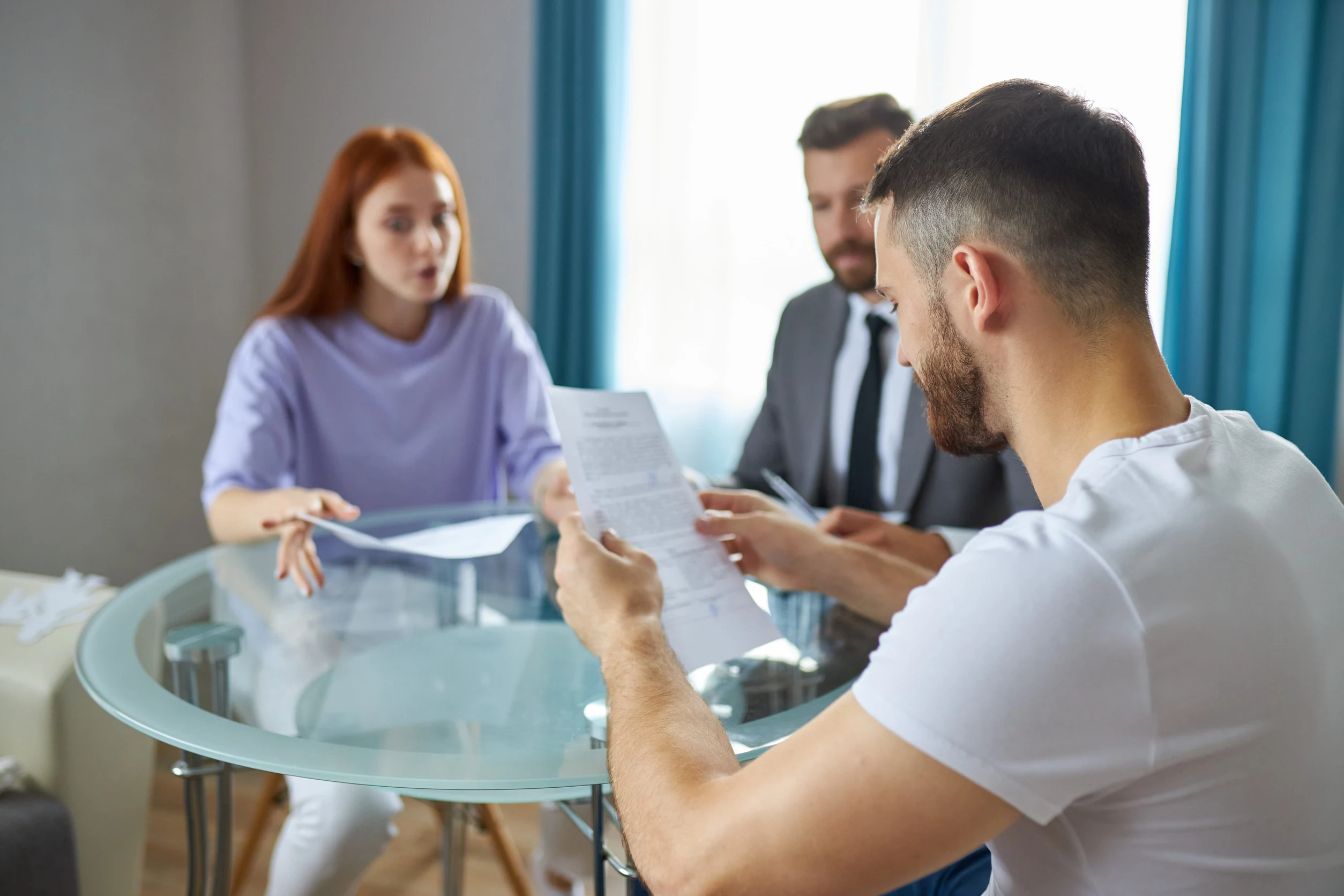 Divorced parents discussing a modified parenting plan and custody schedule in Seattle