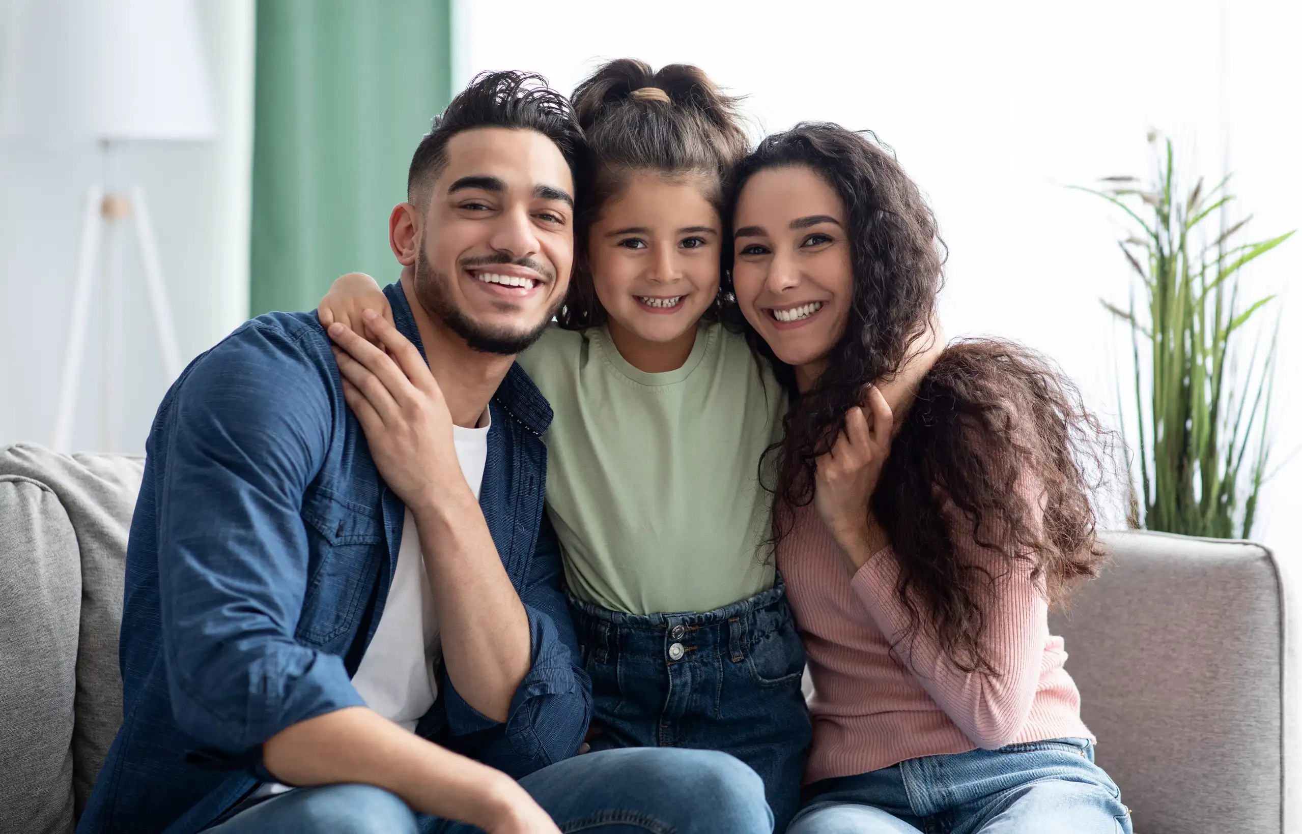 Stepparent and foster family reviewing adoption paperwork with an adoption attorney in Washington State